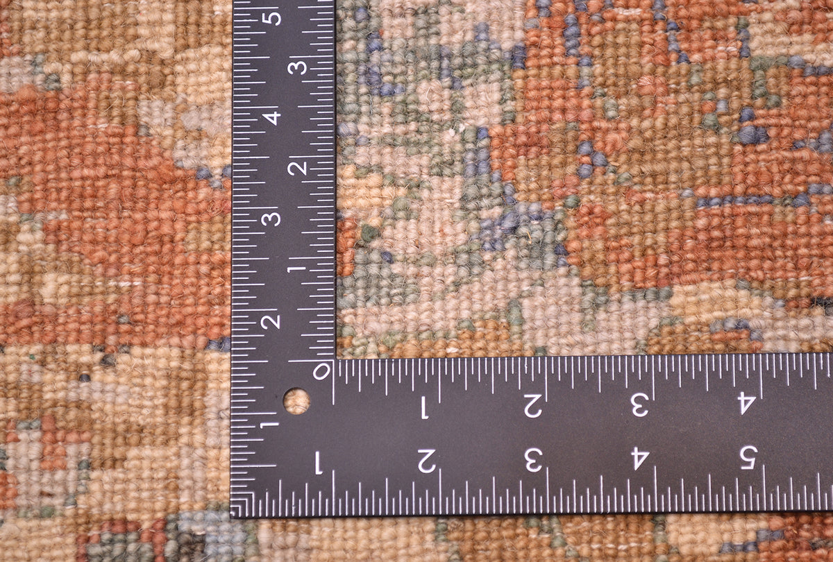 |Reverse of floral carpt showing back of handknotting with chrome dyes in softened colours.