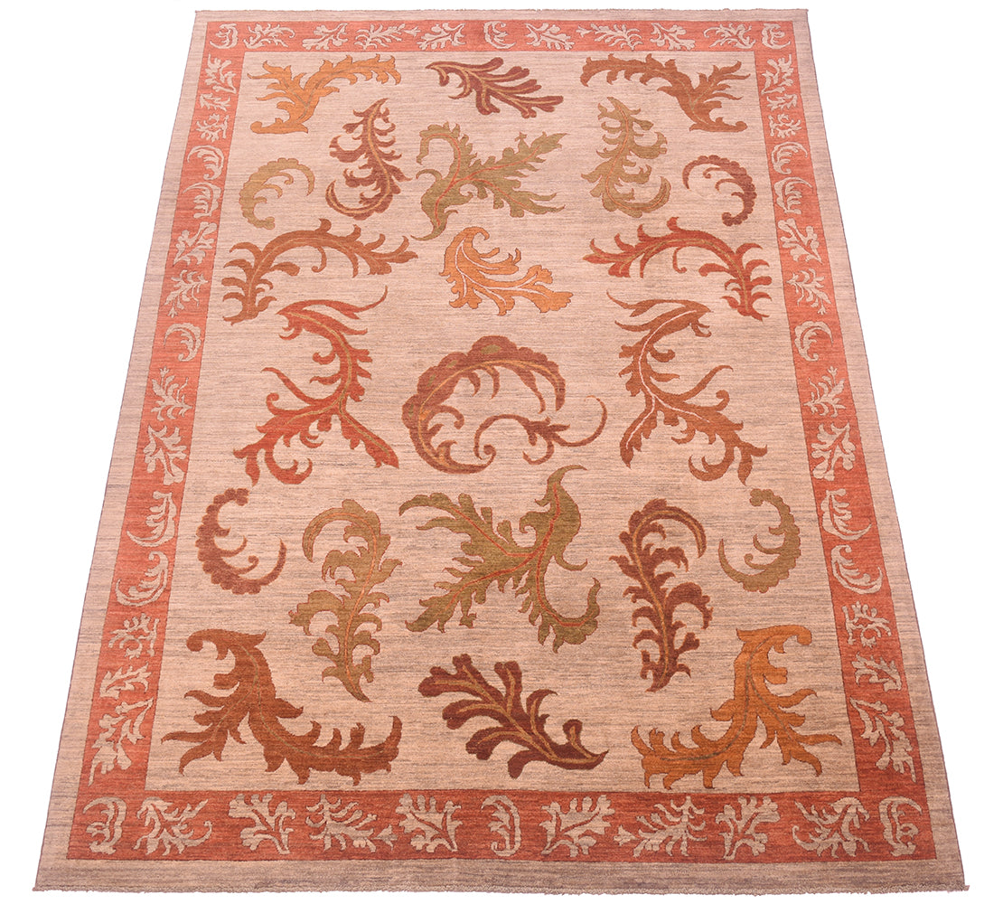 Furling leaf design in main field and border inspired by arts and crafts design. Expressive patternign of overzized leaves and multidirectional positioning in field and border.