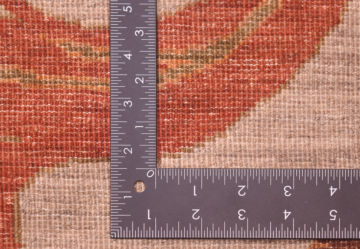 Detail of reverse of carpet shoing fine handknotting of field and motifs with handspun wool and natural vegetable dyes.
