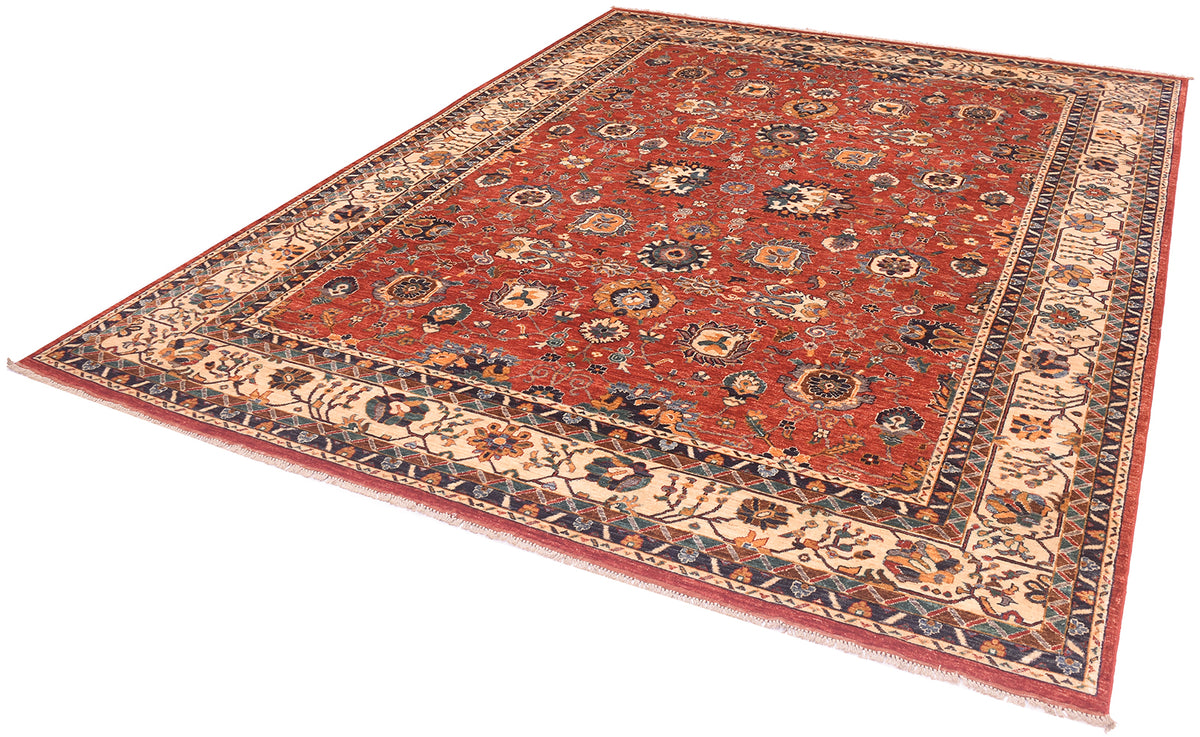 Handknotted Sultanabad design carpet, red with detailed motifs shown from an angle