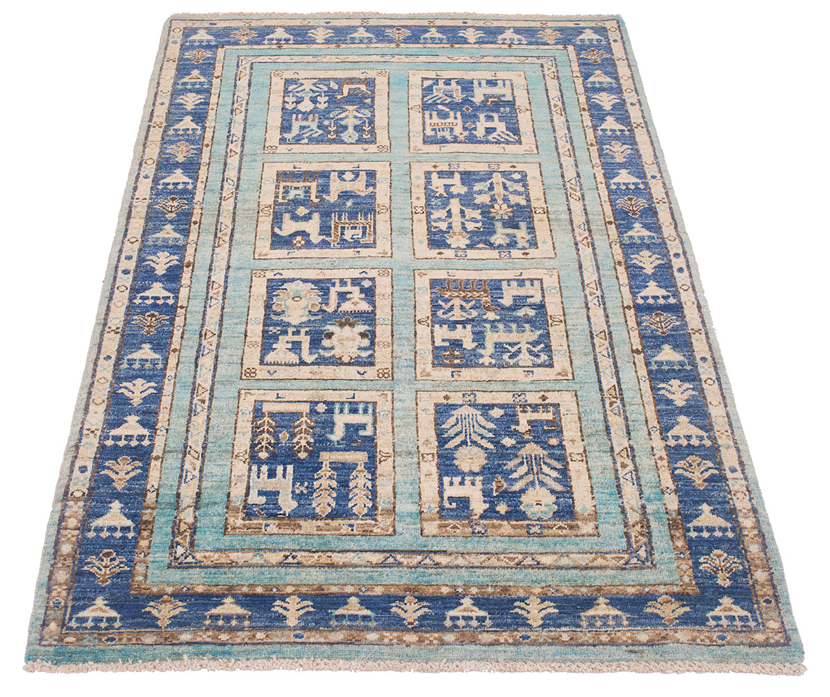 A rectangular Afghan small rug with a traditional geometric and tribal pattern, featuring a dominant blue field, light blue borders, and beige motifs depicting stylised animals and trees.
