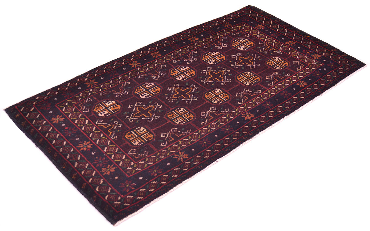 A rectangular Afghan-style Bokhara design Belouch wool small rug with a dark navy and burgundy background, featuring geometric medallions and borders in rust orange, beige, and brown.