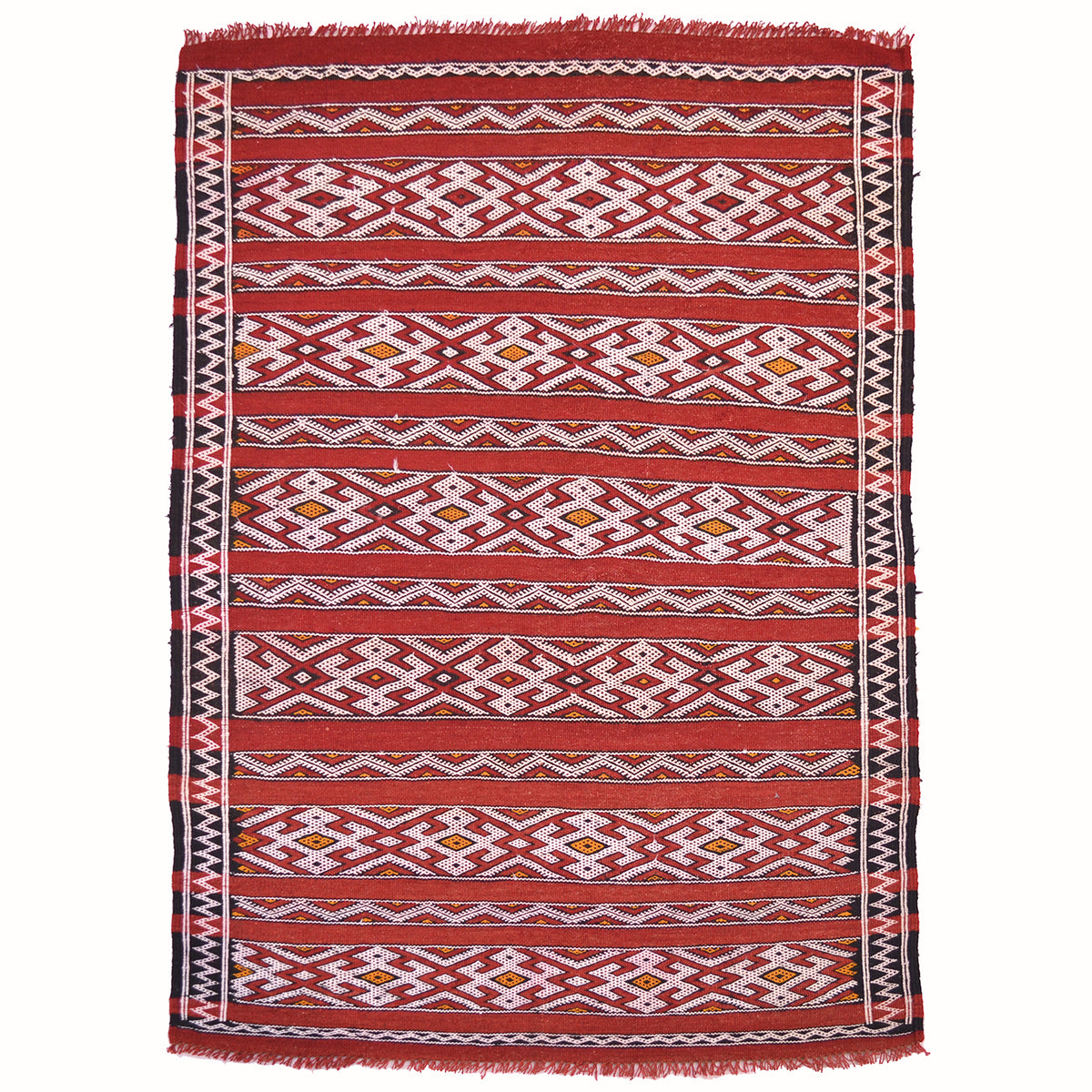 Handwoven Berber Zemmour Kilim rug with geometric patterns arranged in banded format interspersed by plain red stripes.