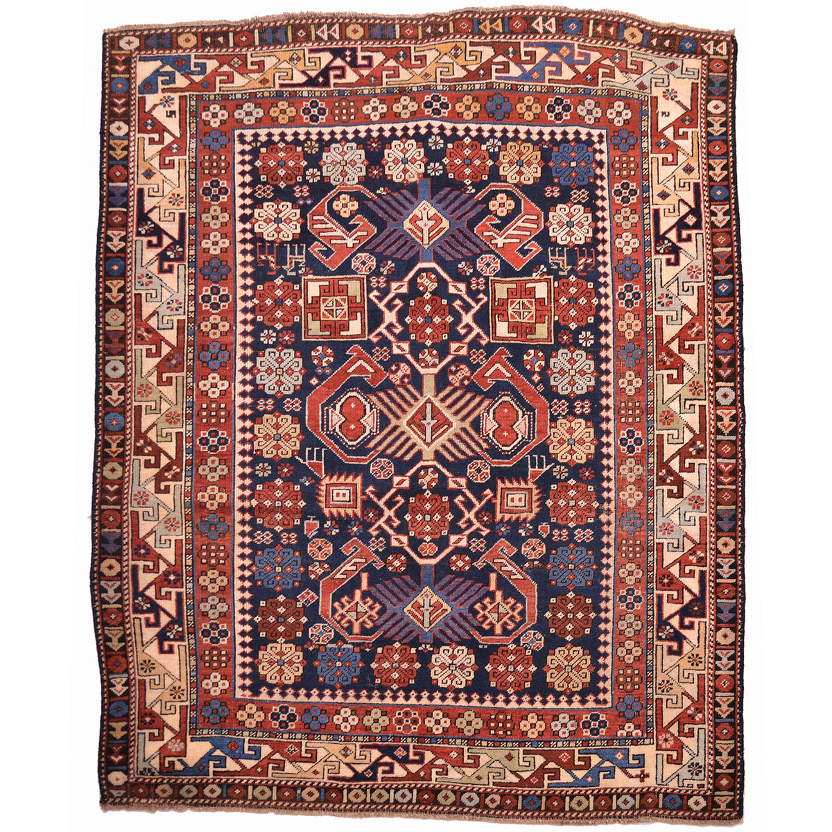Antique Bidjov Shirvan rug circa 1900, striking multi-colour geometric design on a dark blue ground.
