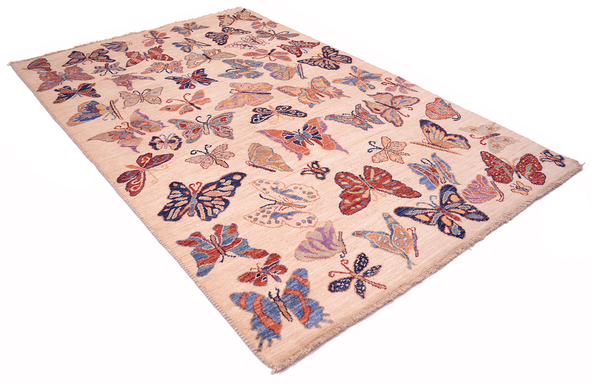 A 180x120cm rectangular Afghan area rug with a cream-coloured base and an all-over pattern of colourful butterflies in shades of blue, red, orange, and purple, shown from an elevated angle on a white background.