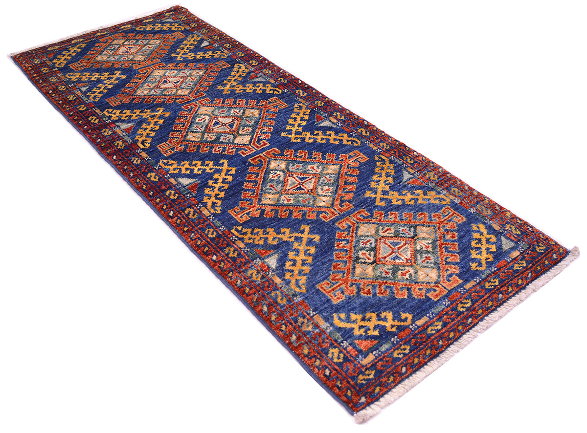 An Afghan Chobi mini runner with a traditional geometric pattern in blue, red, orange, and beige, shown on a plain white background.