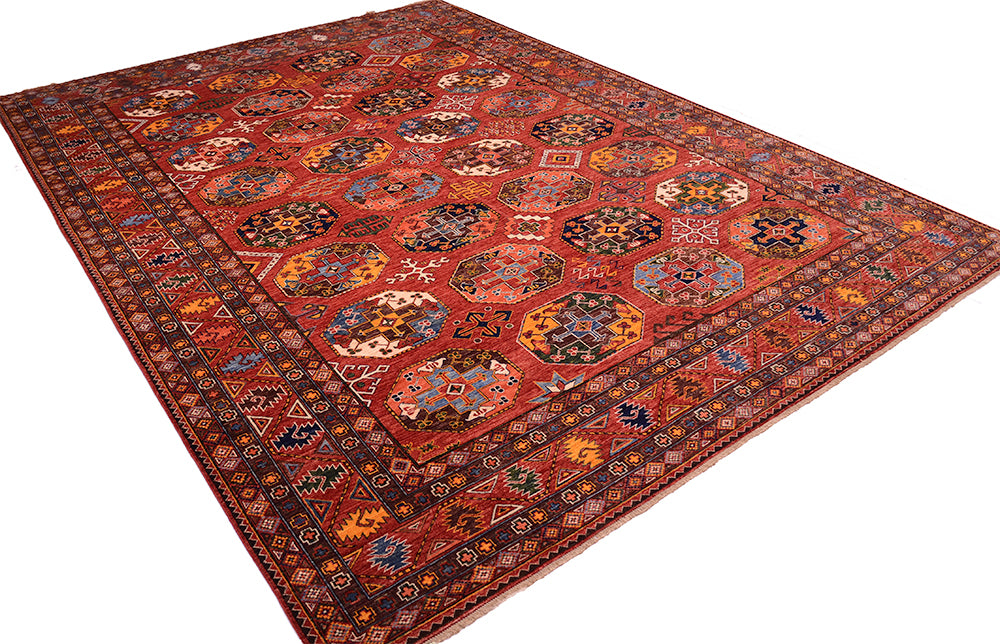 A 4x3m traditional large Afghan Ersari area rug with a complex geometric and floral pattern, featuring a dominant red field with intricate motifs in blue, yellow, black, and white.