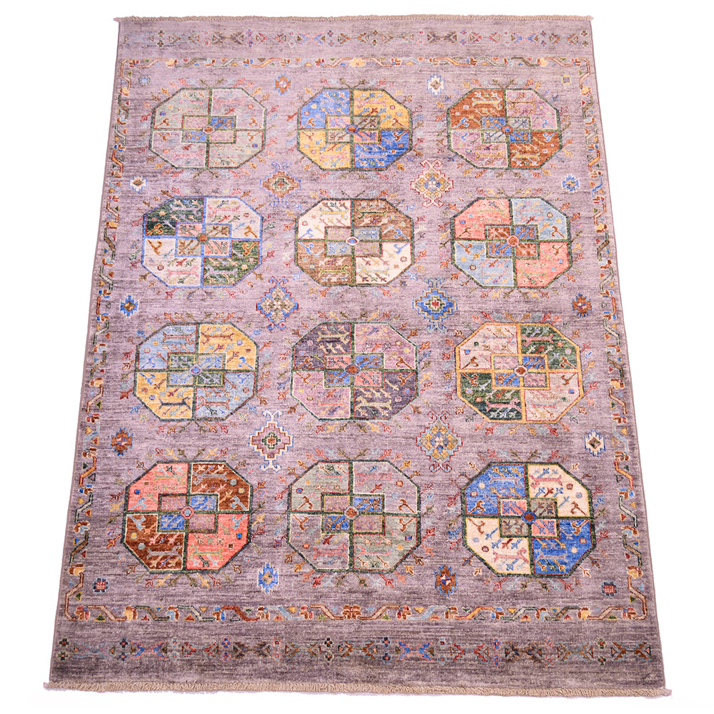 A rectangular Afghan modern Fil Pai area rug with a faded grey base and a detailed geometric pattern featuring twelve central medallions in muted shades of blue, orange, beige, and green.