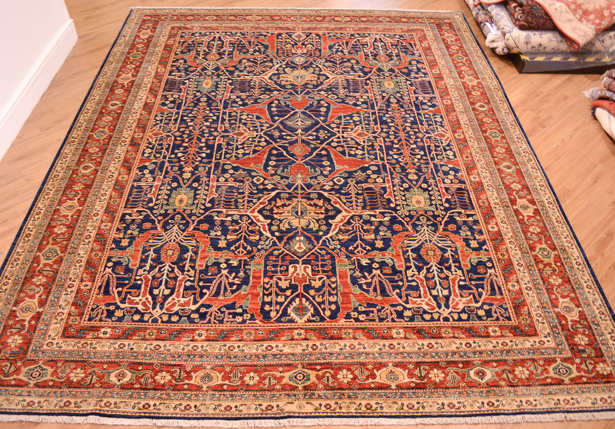 Overall image of Garous Design with ornate field and red, blue and gold detailing.
