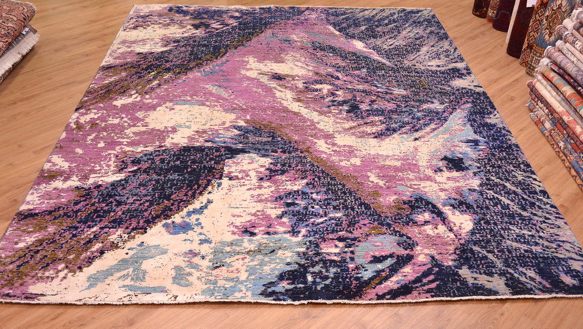 Overall view of abstract modern carpet with natural formation designs with sweeping gestural design and large areas of art viscose silk.