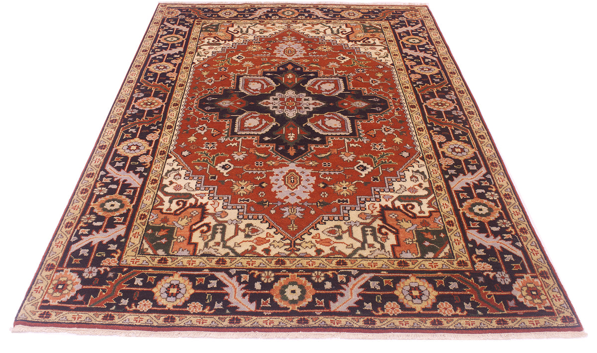 A traditional oriental Heriz area rug with an intricate floral and geometric pattern, featuring a prominent rust-red center medallion and dark navy borders, shown flat against a white background.