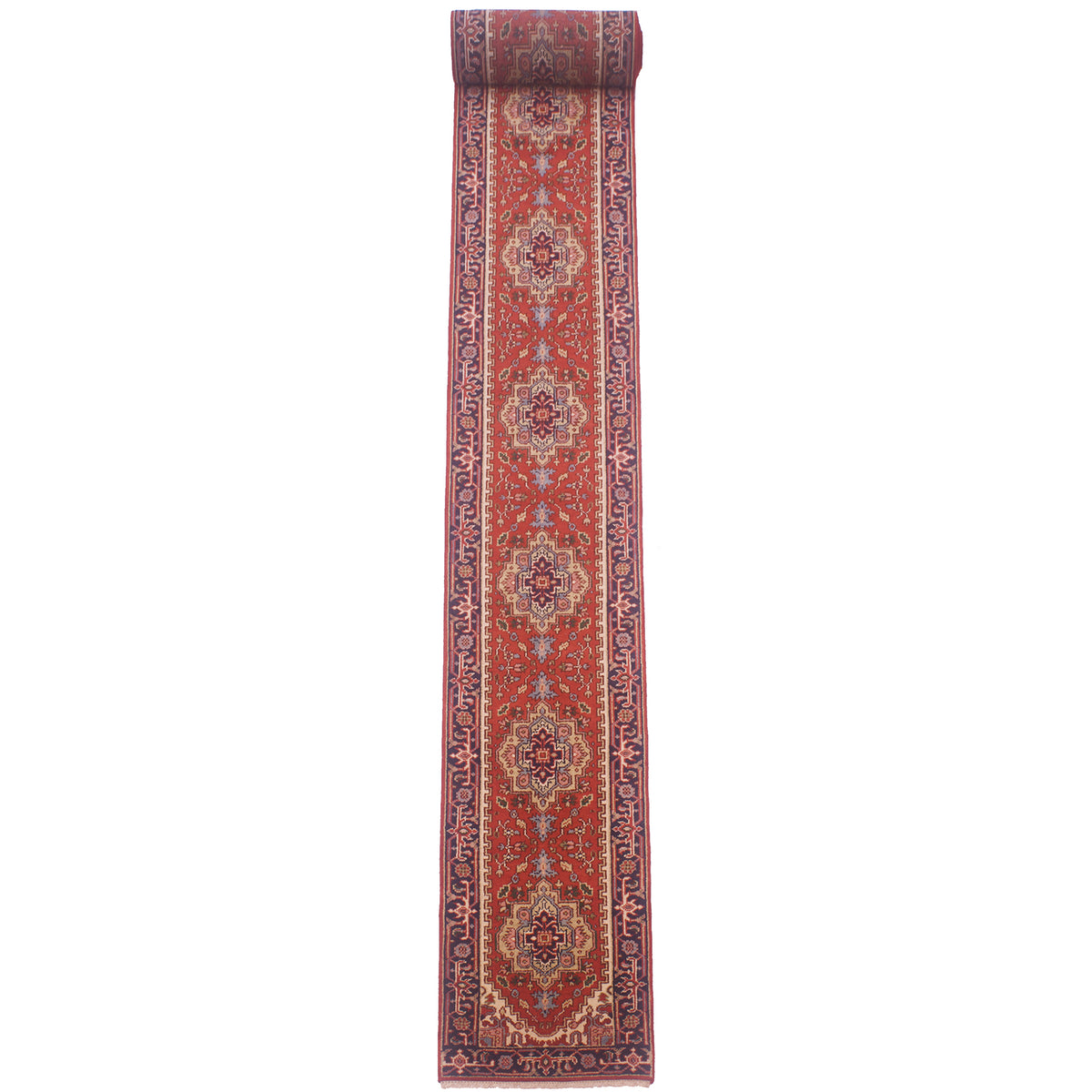 Handmade extra long Indo Heriz runner: orange-rust with navy, blue, yellow and cream.