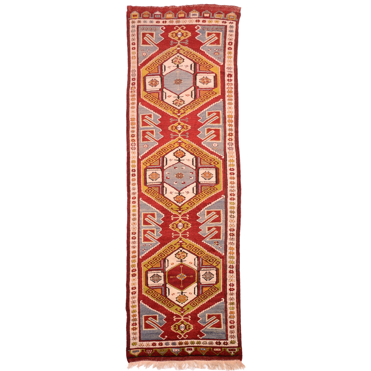 Old Karapinar runner with large scale geometric design on a red ground.