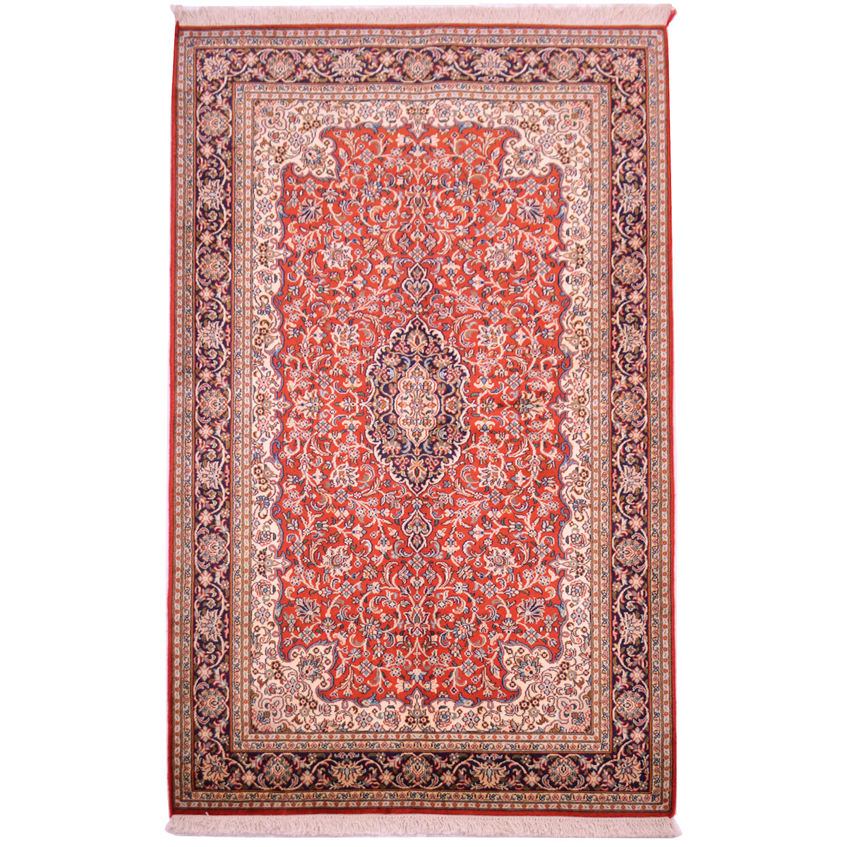 Elegant silk on cotton hand-knotted Indian fine Kashmir Silk rug with floral medallion design featuring a red field with navy medallion and border.