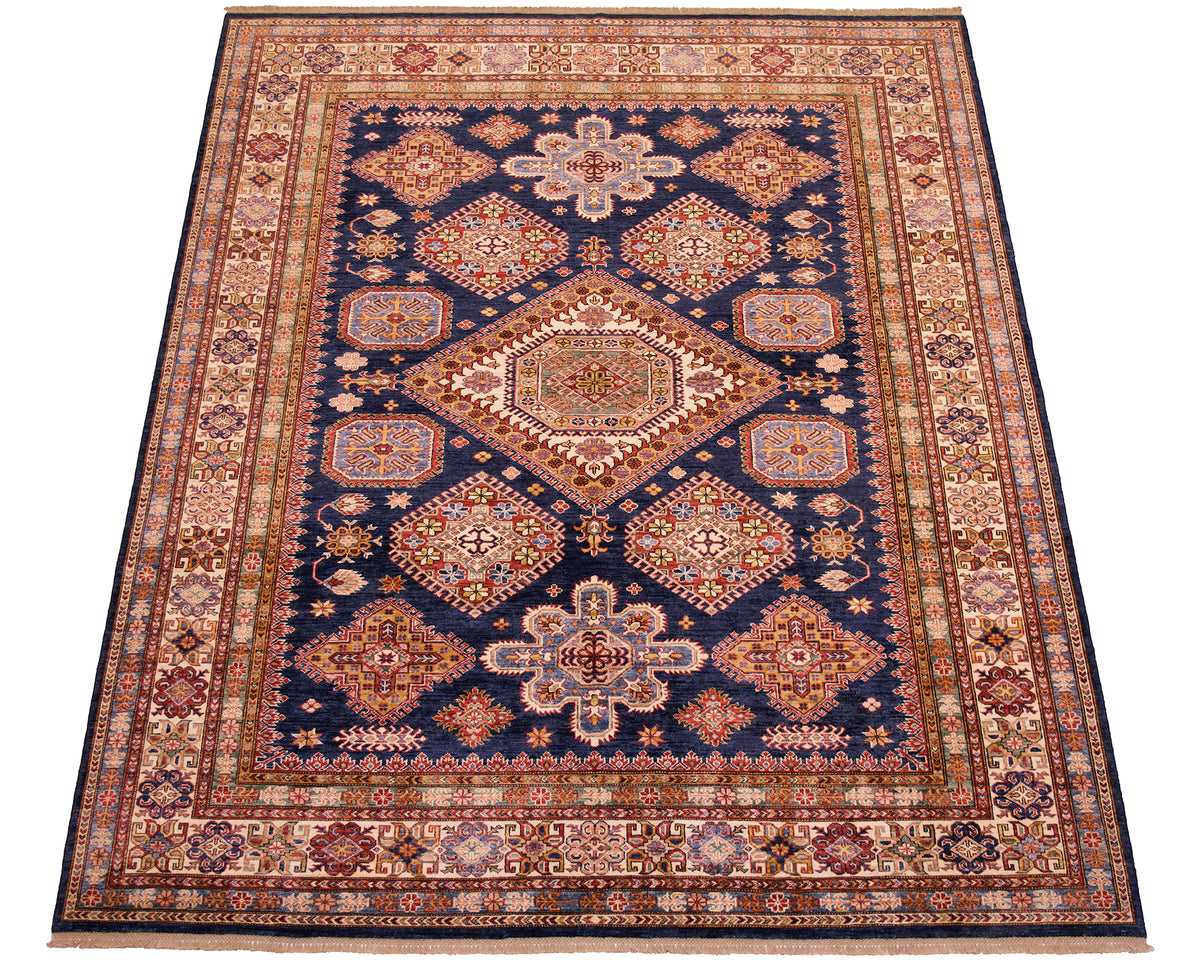 Handmade navy kazak rug with diamond motifs, central medallion, and ornate border