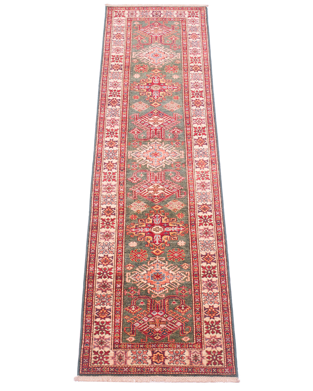 A long fine handmade green Afghan Kazak Runner with an intricate traditional pattern in red, green, beige, and blue, shown flat against a white background.