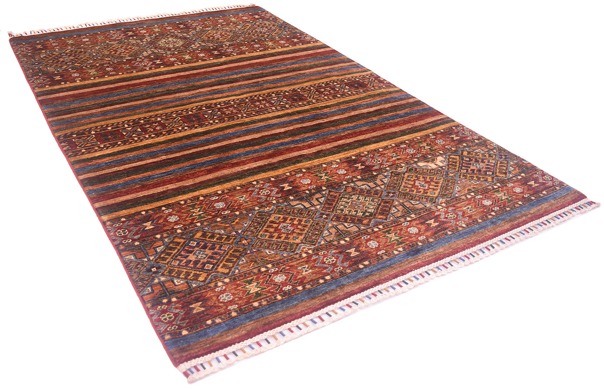 A rectangular Afghan Khorjin area rug with a traditional tribal design, featuring horizontal bands of geometric patterns in red, blue, brown, and beige, finished with white fringed edges.