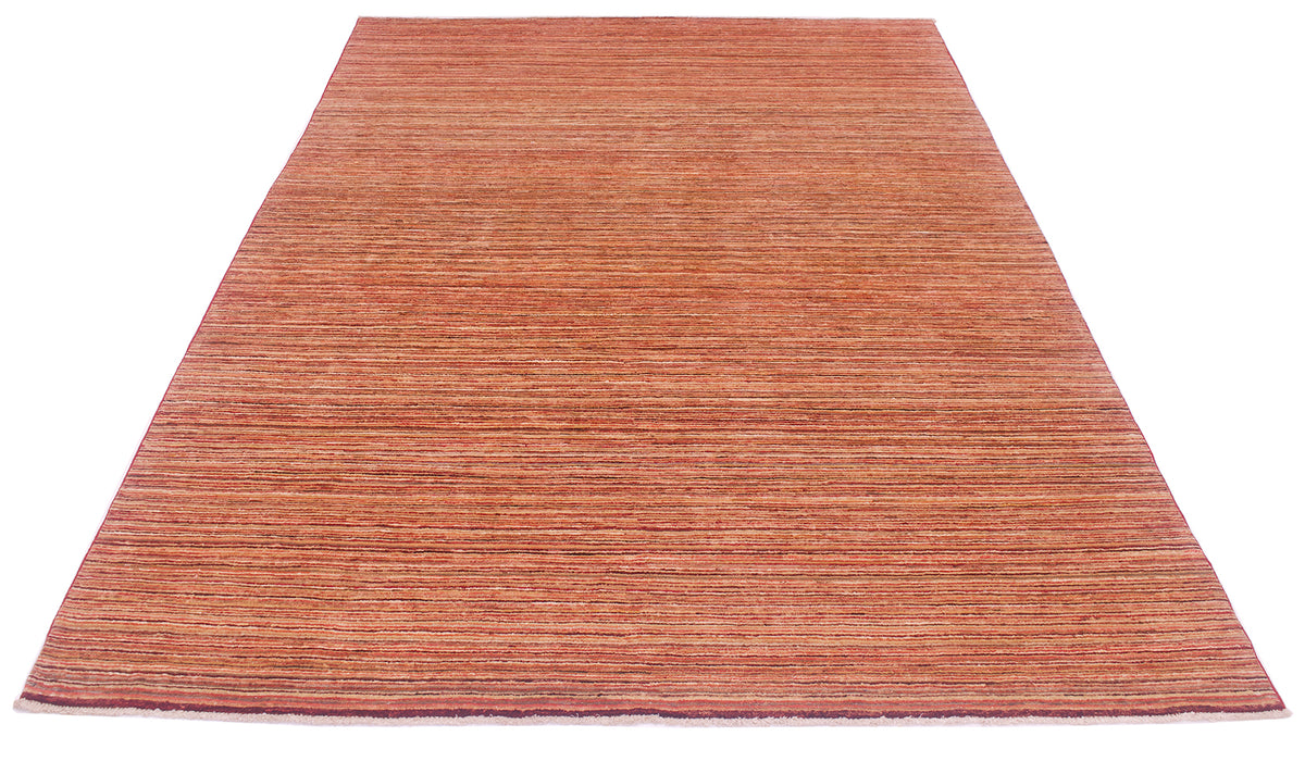 A rectangular handwoven stripy Gabbeh rug with horizontal striped texture in terracotta, rust, and brown tones, shown flat against a plain white background.