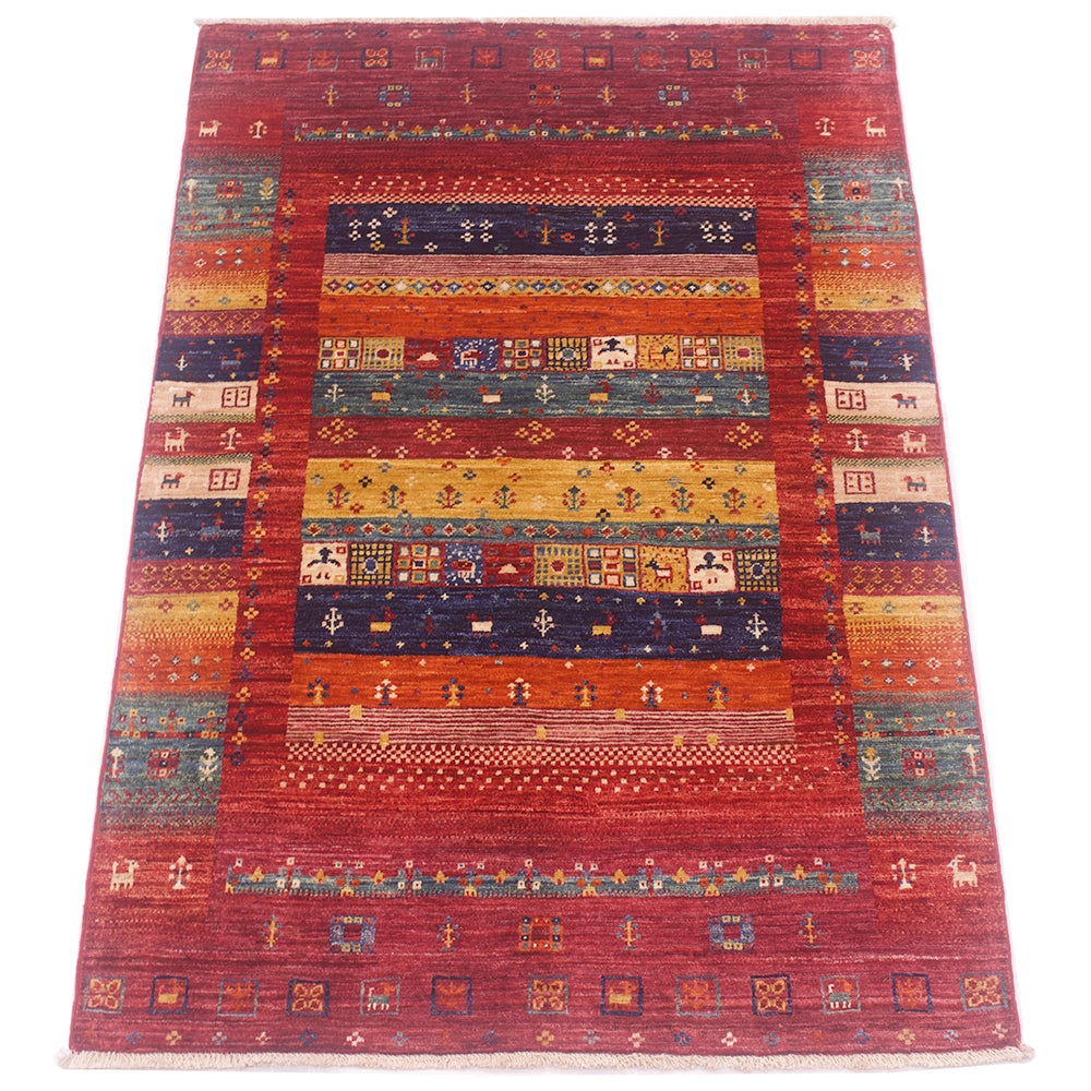 A 5x3 rectangular colourful Loribaft rug with a geometric modern-tribal pattern, featuring a dominant red field, a central navy blue band, and multiple horizontal stripes of orange, yellow, and teal with stylised motifs.
