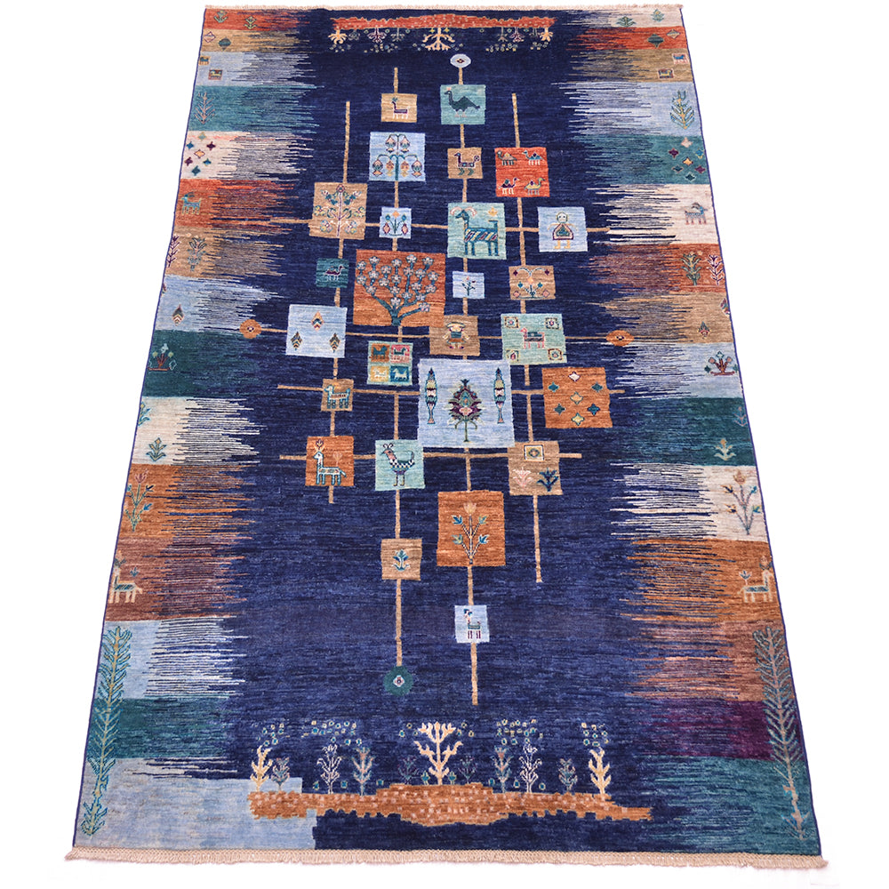 Handmade Loribaft carpet with central cross motif on navy and rust tones