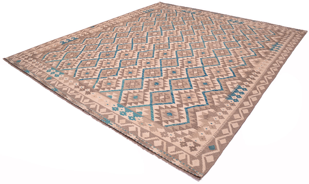 A 10x8 Afghan Kilim area rug with a geometric tribal pattern in beige, brown, and turquoise blue, shown from an elevated angle on a white background.