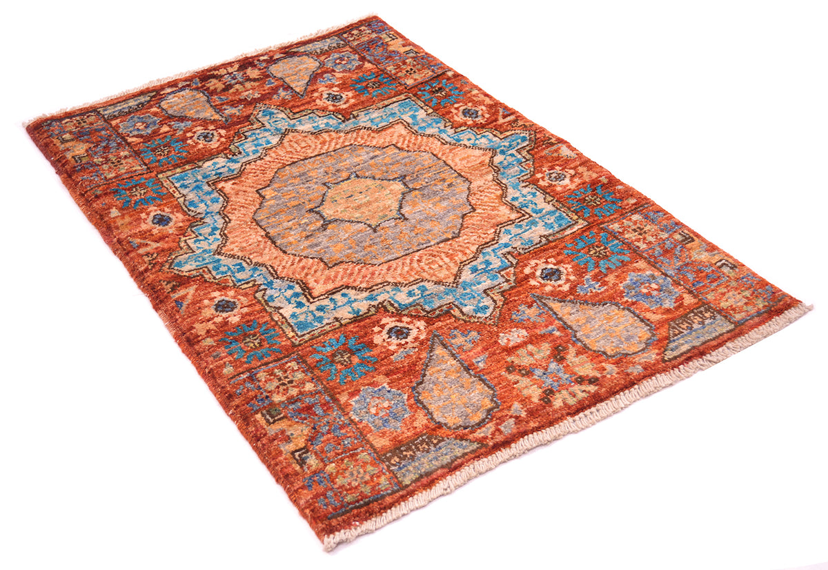 Angle view of Afghan Mamluk wool pile mat with geometric motifs