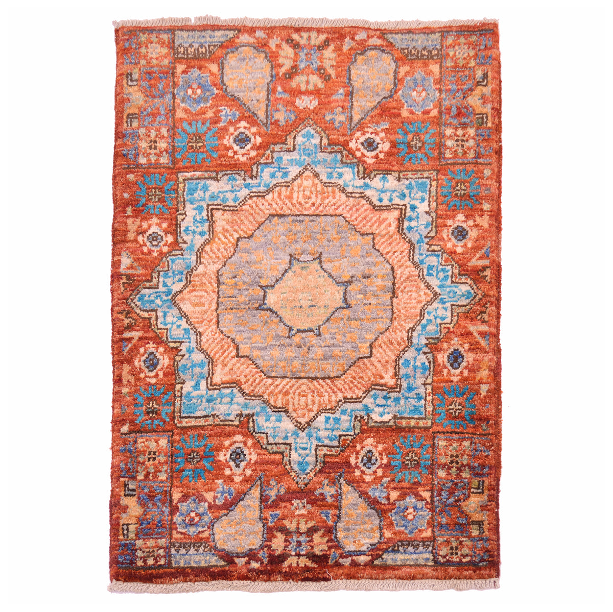 Rust Afghan Mamluk mat with geometric medallion design.
