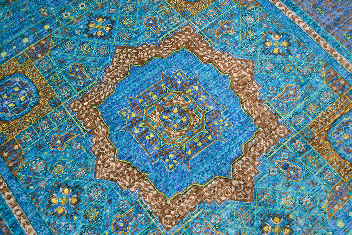 Detail of geometric Mamluk medallion with brown and turquoise