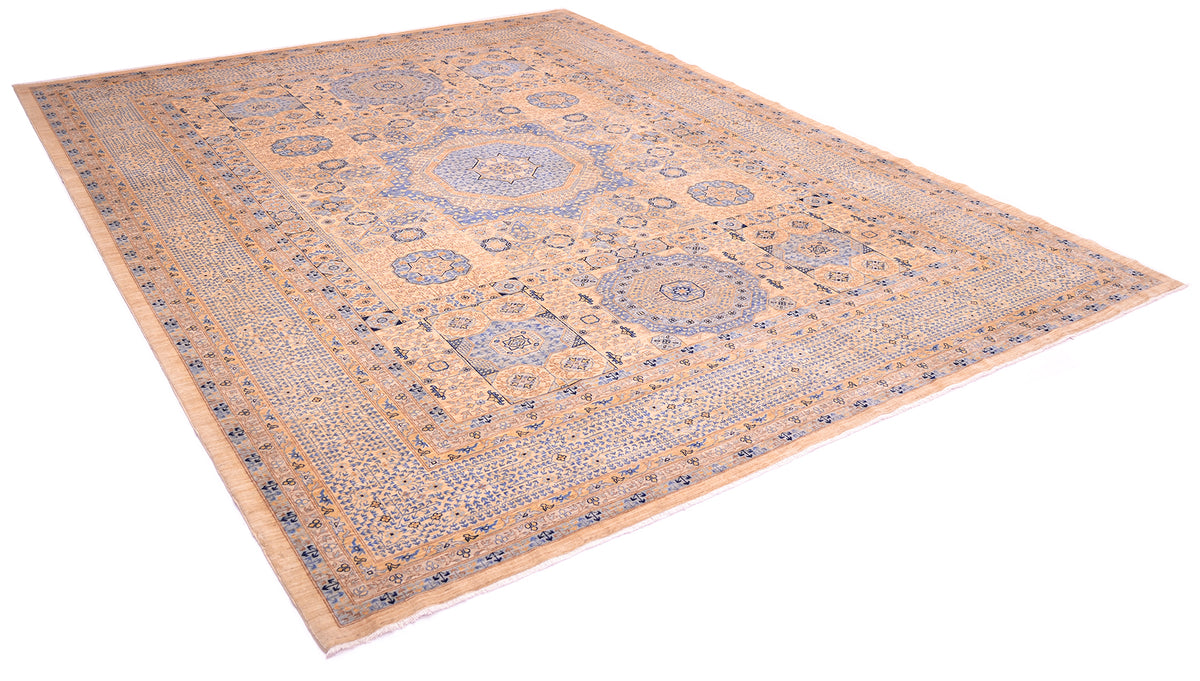 Angled view of handwoven area rug in cream and blue on white background