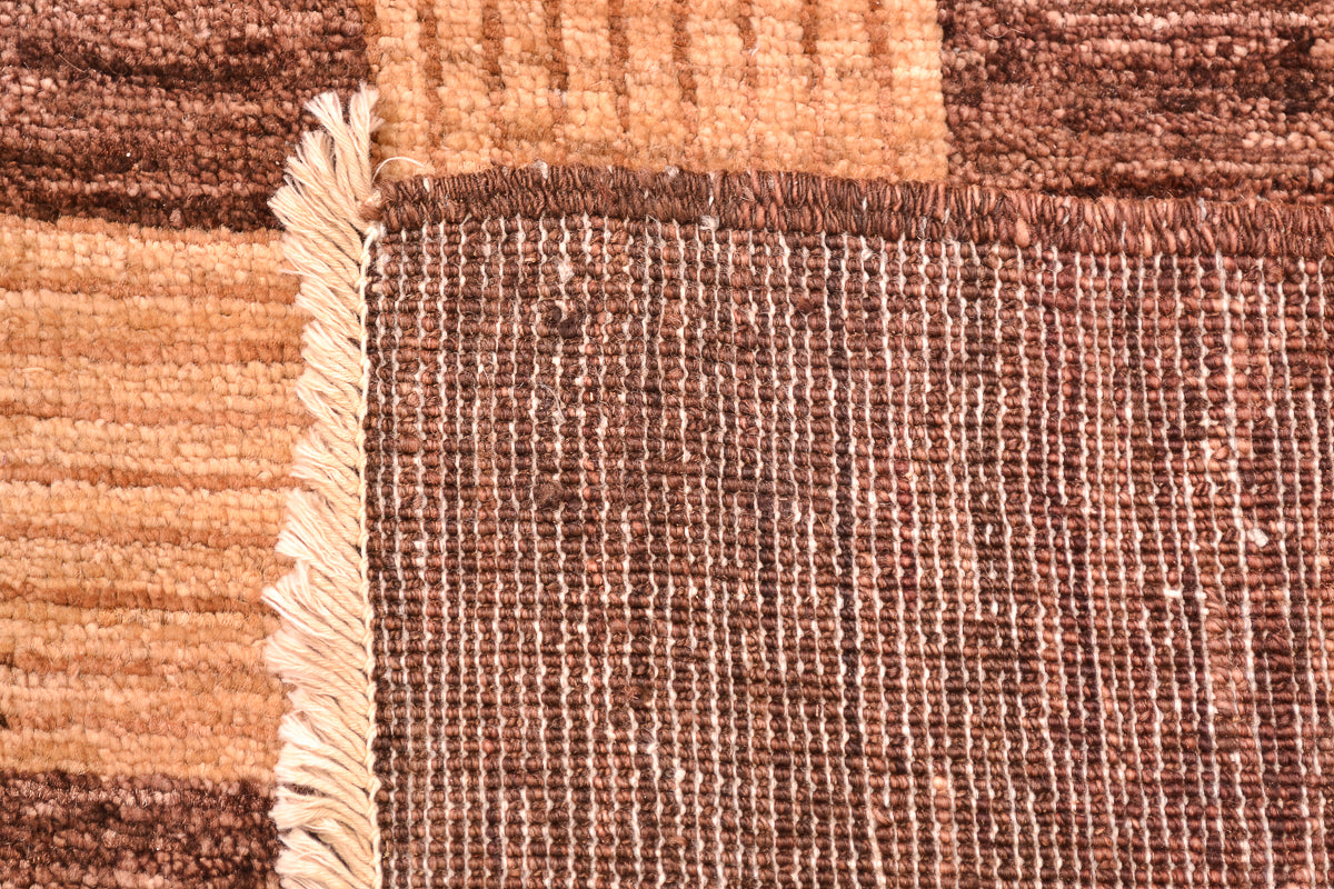 Handmade and hand-knotted Modern design Afghan Chubi Carpet with parqueted central design and wide brown plain border.