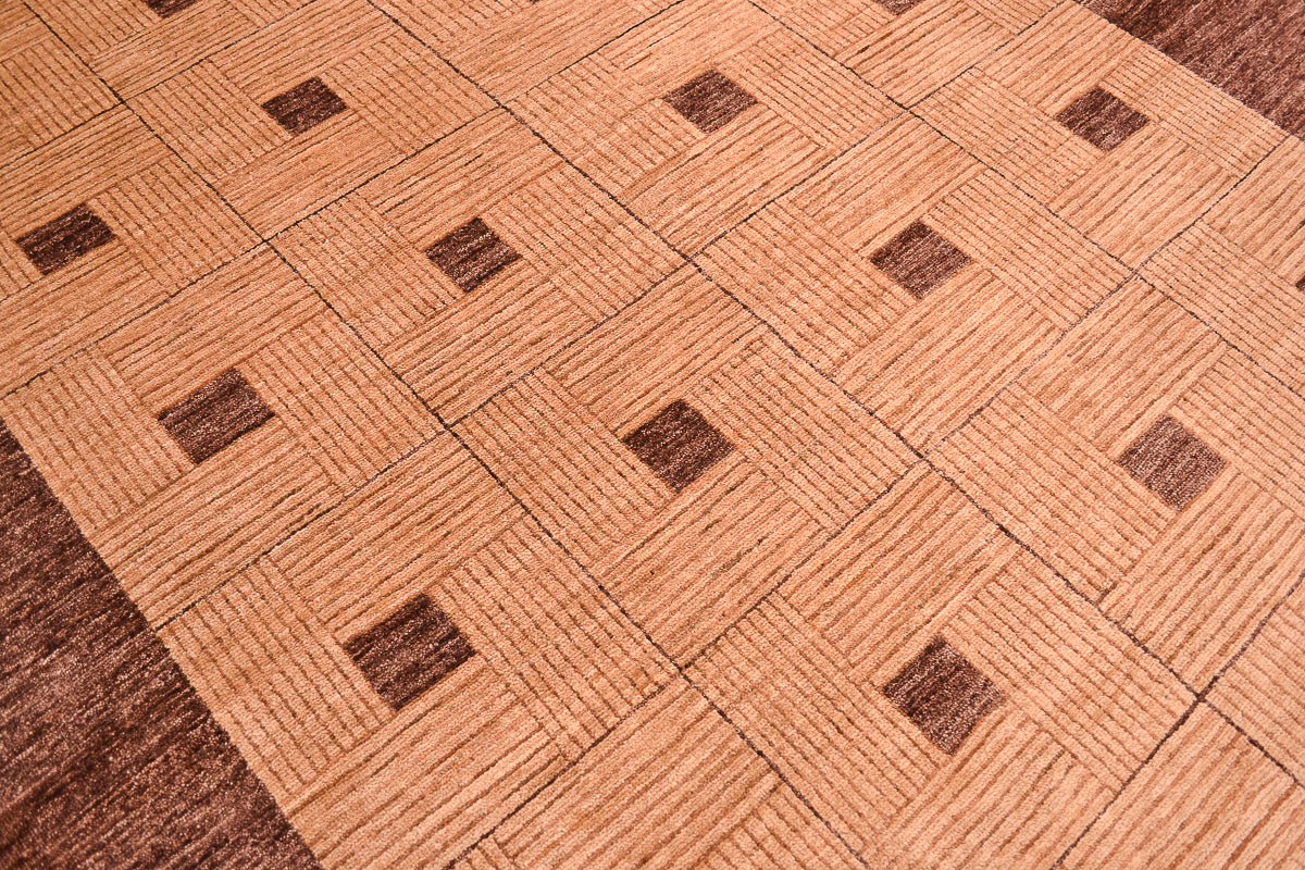 Handmade and hand-knotted Modern design Afghan Chubi Carpet with parqueted central design and wide brown plain border.