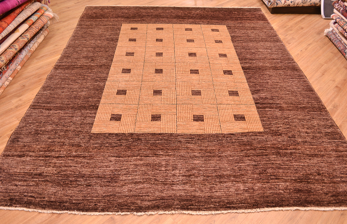 Handmade and hand-knotted Modern design Afghan Chubi Carpet with parqueted central design and wide brown plain border.