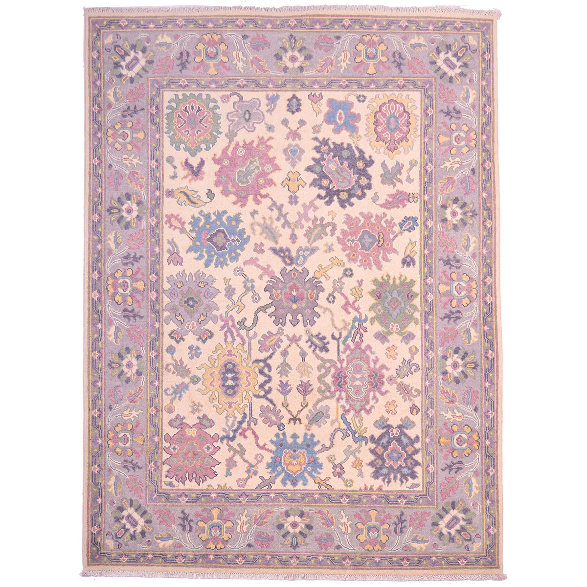 Oushak rug; beige with large scale floral design in blue, green, yellow and grey, with soft grey main border.