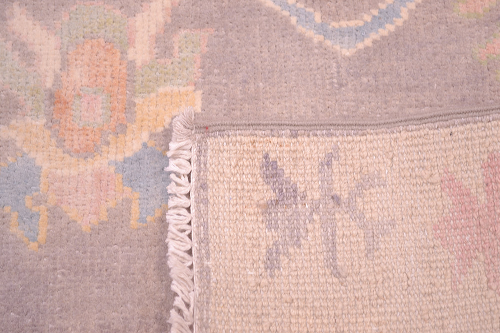 Back of runner showing knots and weave.
