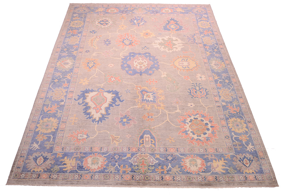 Spacious field of Oushak carpet handknooed with soft colours of blue and grey