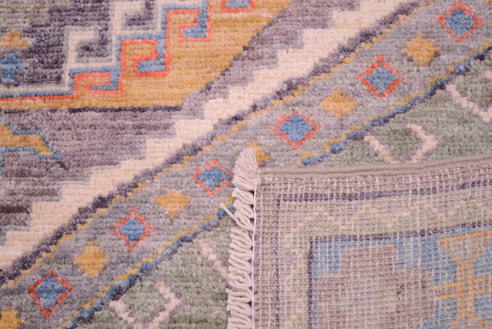 Reverse of Afghan Rug with geometric turkish designs