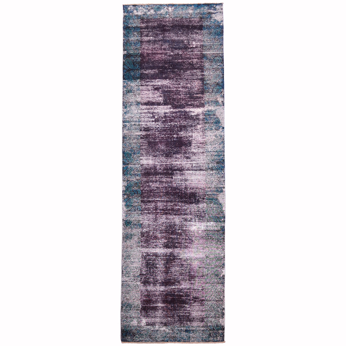 Overdye runner with distressed pile of deep aubergine field colour with teal green border of ghostly paisley design.