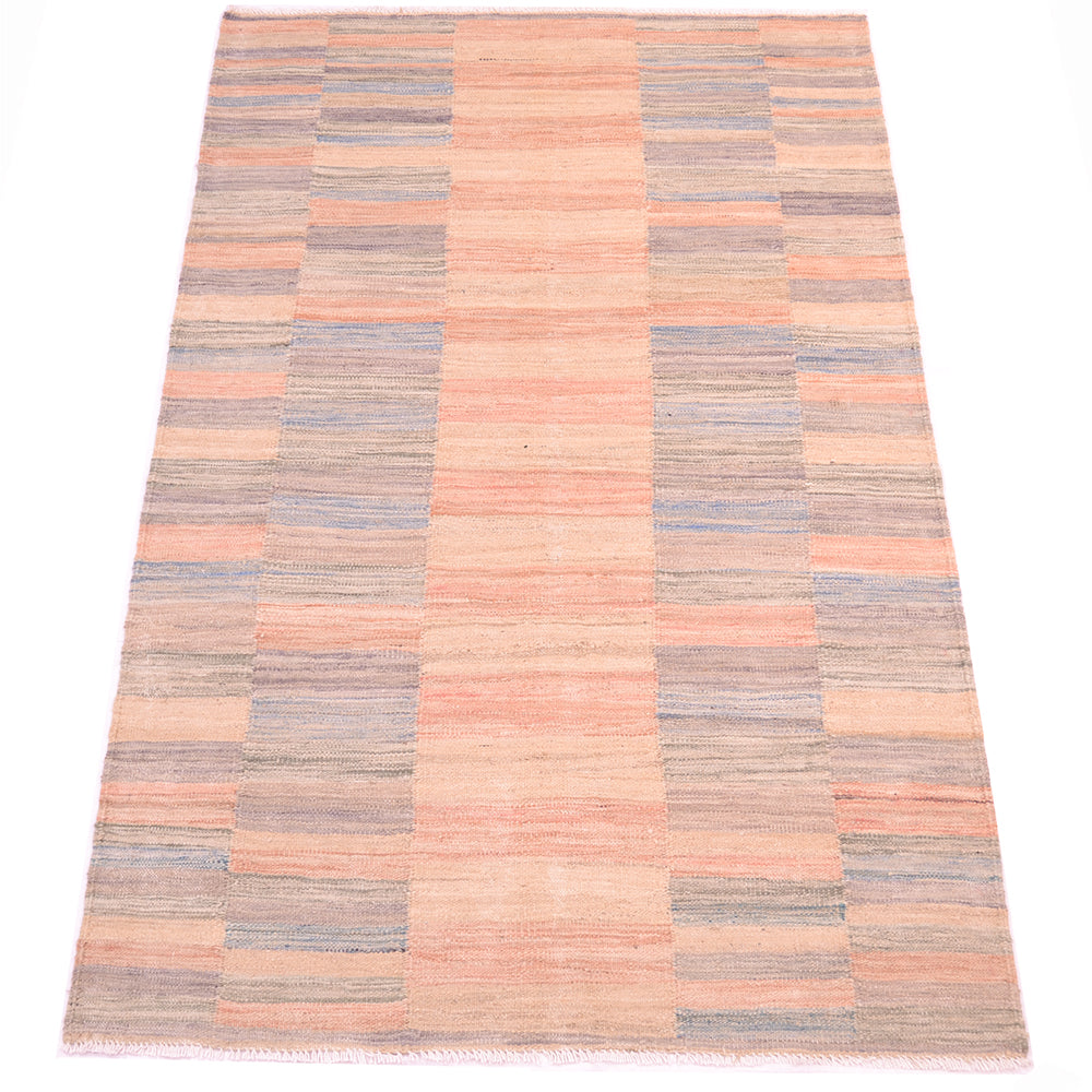 Overall vuiw of modern pastel abrash kilim with geometric compartmentalized design. Handwoven flatweave modern design with modern soft colours.