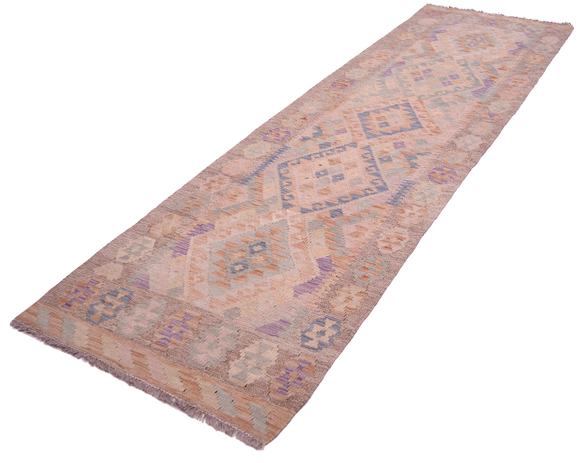 A 285cm long rectangular Afghan Soft colour Kilim runner with a geometric pattern in muted shades of beige, dusty pink, lavender, and blue, shown on a plain white background.