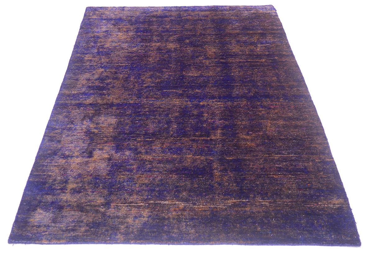 A rectangular area Sari Silk rug with textured pattern in deep purple and brown tones, shown flat against a solid white background.