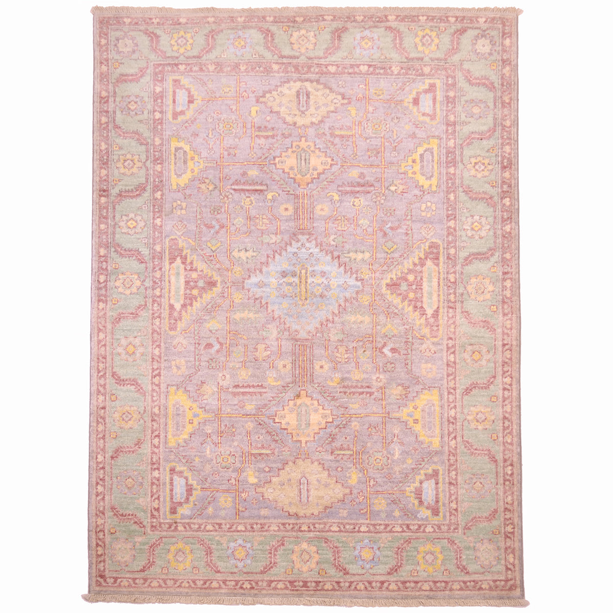 Serapi rug from Afghanistan pale colours: grey field with green border plus detail shades of pale blue, yellow and reddish pink.