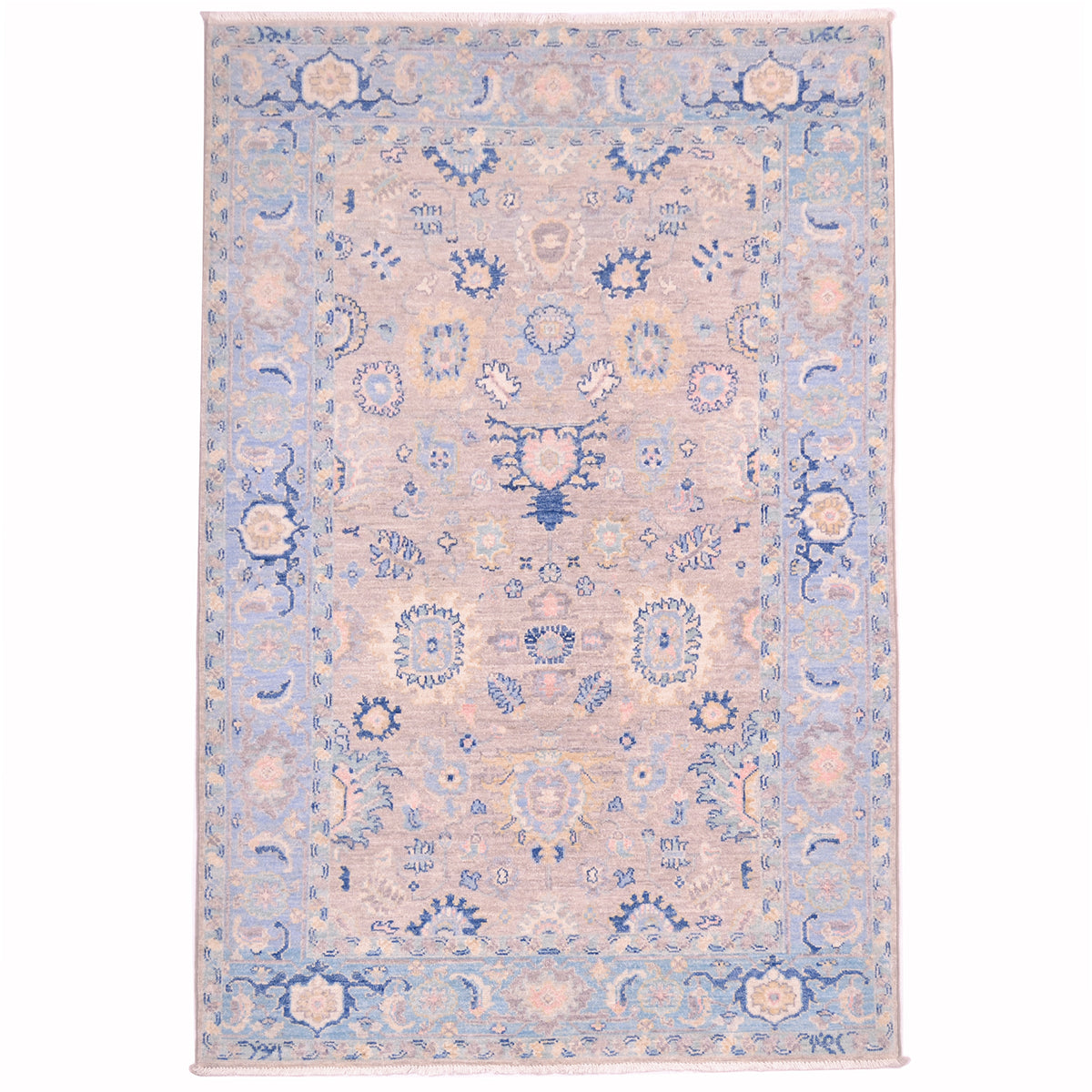 Afghan Serapi rug with super soft pastel colours, floral design on a grey field with soft blue border. All over floral motifs