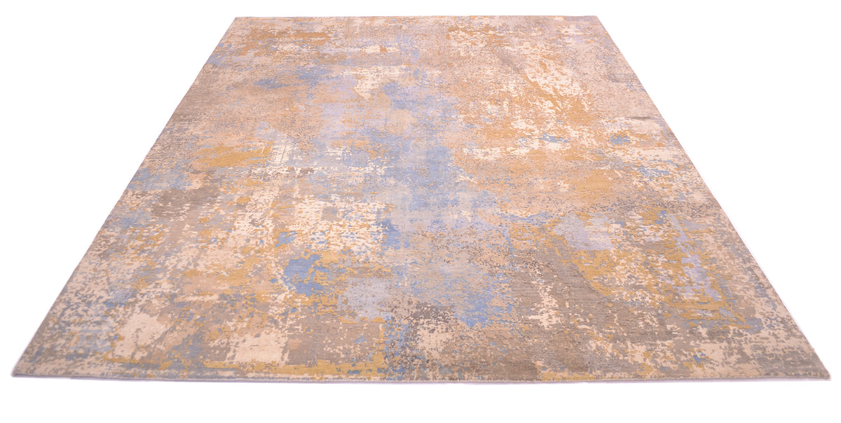 Overall view angled of impressive indian handknotted carept in light blue, light grey, and ivory cream. Silk highlight that are cut by hand in goldne beiges and grey slivers. Nuanced pastel tones blended tonalities.