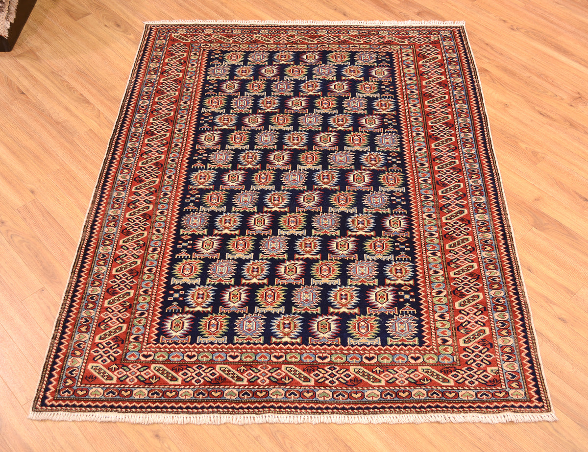 Fine handmade Afghan Shirvan Rug with all over flaming boteh design on a dark blue field (rather like Marasali Rugs).
