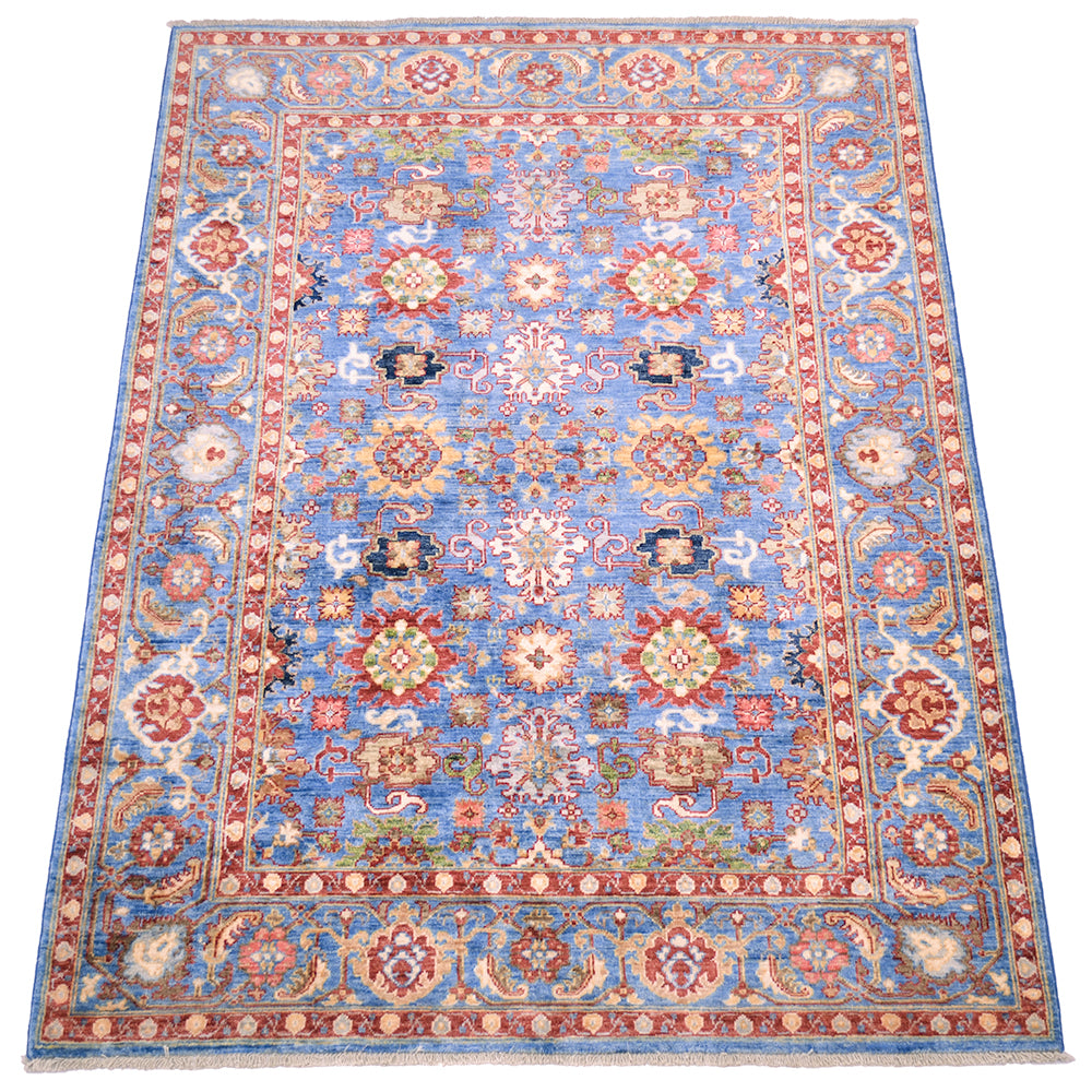 Traditional Sultanabad Afghan design with a stunning light blue ground colour with additonal colours of red, gold , green and terracotta. Magnficent border with cloudband and unfurling leaves.