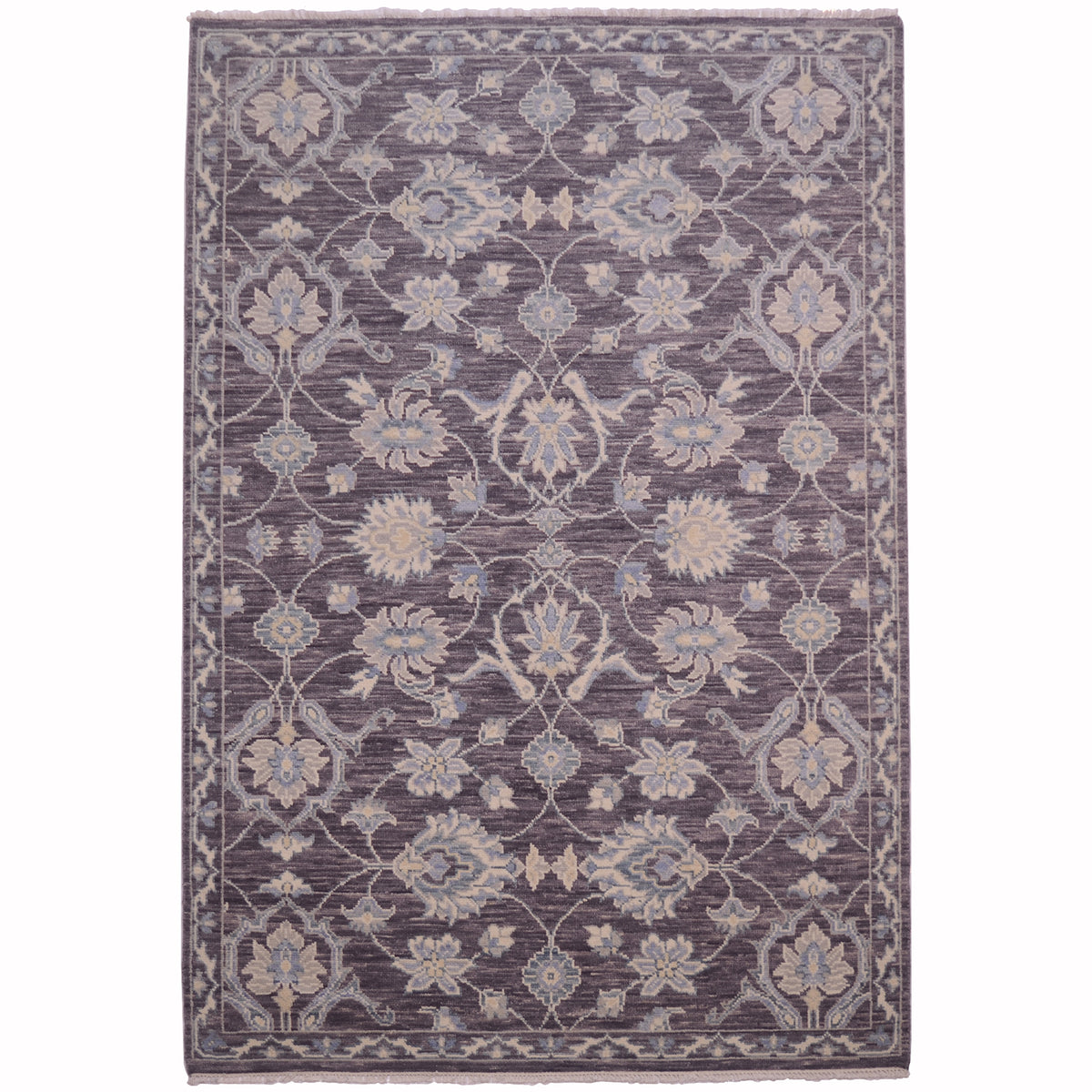 Handmade Tonal rug from India with pewter grey main colour and all over floral pattern.