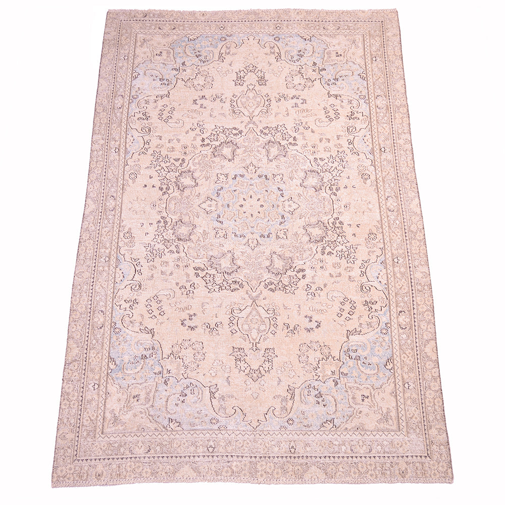 A rectangular vintage carpet with an intricate traditional floral pattern in softcreamy beige, light blue, dark and mid brown detailing. Classic oriental medallion shown flat against a white background.