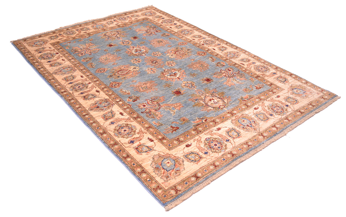Handmade Afghan Ziegler rug laid diagonally, light blue with orange and cream medallions