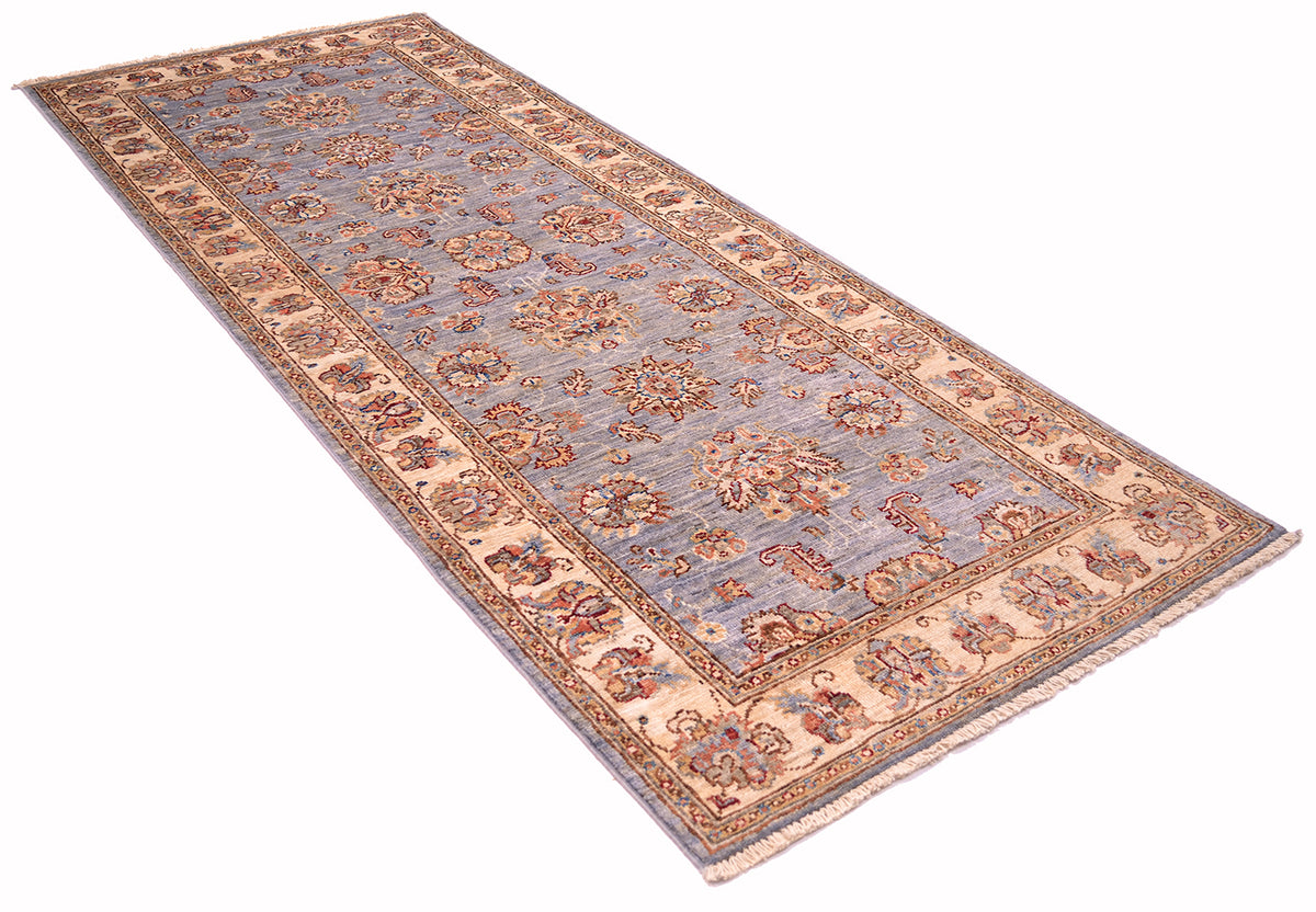 Angled view of Afghan Ziegler Runner handknotted with natural vegetable dyes.