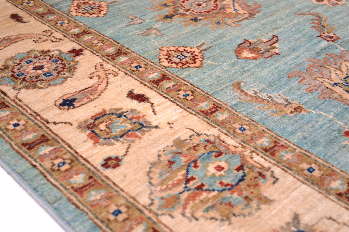 Detail of Ziegler border with palmette and floating leaves with ivory cream background